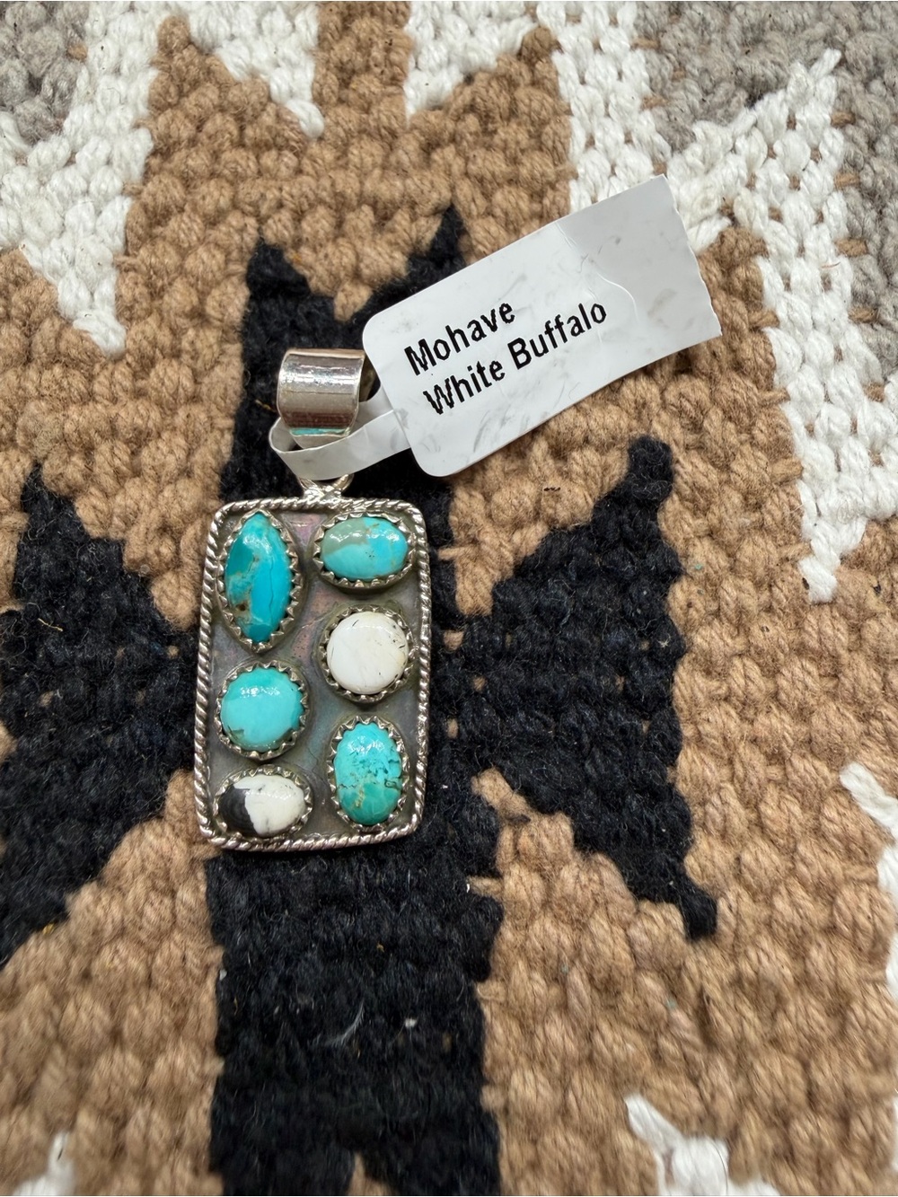 Mohave turquoise White Buffalo stone pendant sterling silver